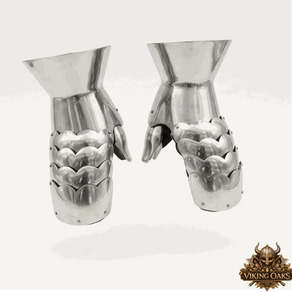 Handcrafted steel gauntlets featuring comfortable leather inner gloves